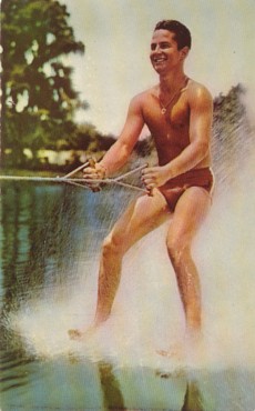 Featured is a postcard image of (at the time) Men's World Water Ski Champion, Dick Pope, Jr., barefoot waterskiing at Cypress Gardens.  He actually was the originator of barefoot waterskiing and his parents were the founders of Cypress Gardens!  The original c 1950 unused postcard is for sale in The unltd.com Store.  